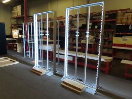 (2) Double-sided SuperNova Lightbox Monitor Stands with Monitor Mounts (96" H x 48" W). Shown w/o SEG Fabric Graphics